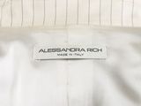 a close up of a white shirt with a label on it