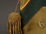an image of a hat with a tassel on it