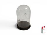a glass bellow with a wooden base and a black base