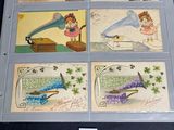 four cards with pictures of people on them on a table