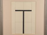 painting of a black cross on a white background in a silver frame
