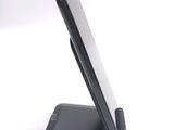 a cell phone that is sitting on a stand