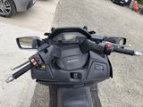 a motorcycle that is parked on the side of the road