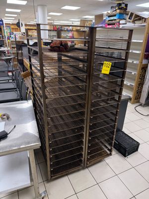 a rack of food that is on the floor in a store