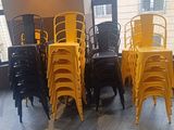 a lot of chairs that are sitting in a room