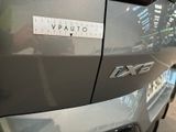 a close up of a car with a sticker on it