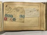 an open book with a lot of stamps on it