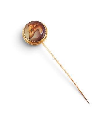 a close up of a stick with a horse on it