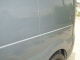 a van that is parked on the side of the road