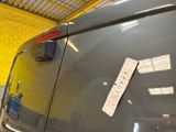 a sticker on the back of a car with a sticker attached to it