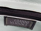 an image of a close up of a handbag with a label on it