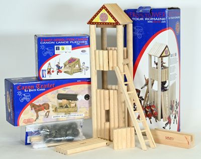 a wooden building set that includes a horse stable, a ladder, and a box