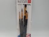 two black and gold paint brushes in a plastic bag
