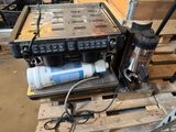 a machine that is sitting on top of a pallet