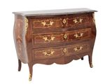 a small chest of drawers with a marble top