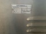 a close up of a metal cabinet with a sign on it
