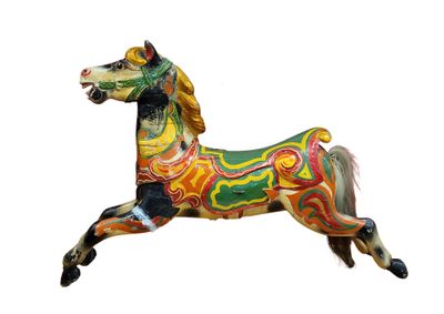 a colorful horse that is standing on its hind legs