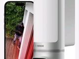 an image of a smart phone with a camera attached to it