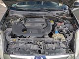 a car with its hood open and the engine in the trunk
