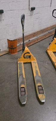 two forklifts that are sitting on the floor