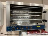 an image of a toaster oven that is open and ready to be cooked