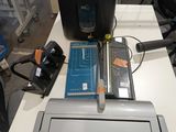 an image of a printer and a scanner on a table