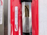 a knife and a blade in a package on a table
