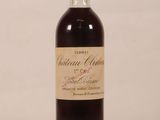 an image of a bottle of wine sitting on top of a table