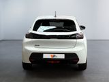 the rear end of a white car in a white room