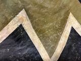 a close up of a piece of art that is on a table