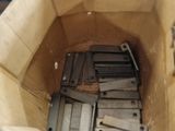 a cardboard bag full of batteries sitting on a table