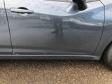 a car that is parked on the side of the road
