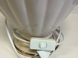 an image of a lamp with a cord plugged into it