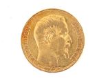 a gold coin with a picture of a man on it