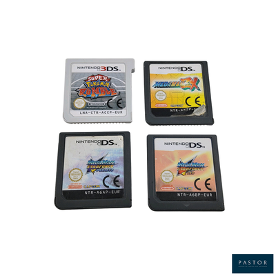 trois jeux Nintendo DS sont posés les uns à côté des autres