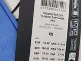 a close up of a label on a blue shirt on a hanger