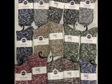 several pairs of men ' s socks with tags on them