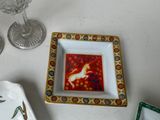 a small plate with a picture of a horse on it