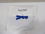 a white pillow with a blue bow on it