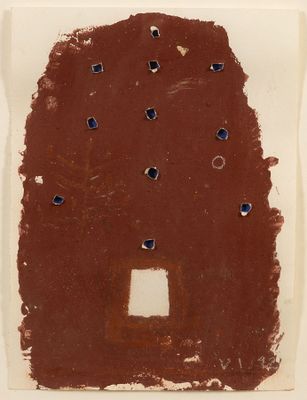 une image représentant un morceau de papier marron percé de trous