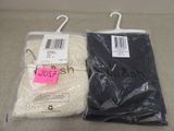 two bags of rice and a bag of rice on a table