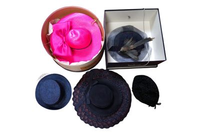 a box with a hat, a hat, and other items in it