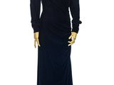 an image of a mannequin wearing a black dress on a mannequin stand