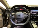 the interior of a car with a steering wheel and dashboard