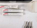 a lot of tools that are laying out on the table