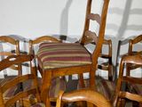 a lot of chairs that are sitting in a room