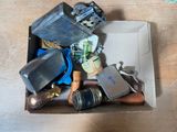 a box full of assorted items sitting on a table