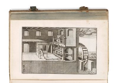 une vieille photo représentant le dessin d'une machine dans une usine