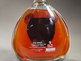 a bottle of liquor that is sitting on a table