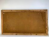 an old wooden frame with a piece of brown paper on it